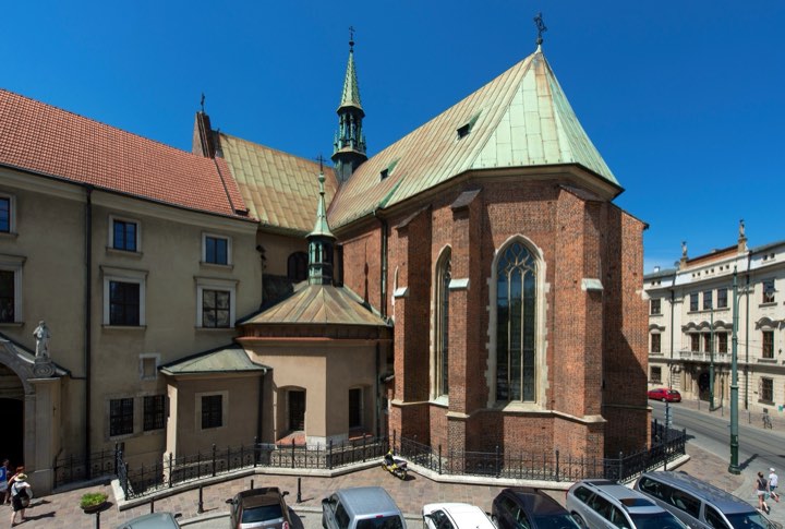 Brick Gothic church with a green copper roof